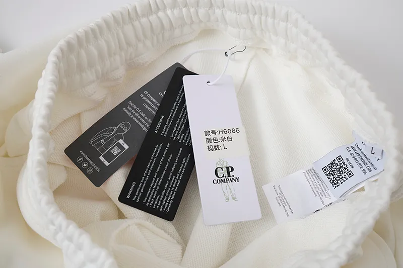 H 6066 C.P Company Classic terry terry slim fit sports sweatpants with side patch pockets, zipper lens decoration sweatshirt Color: Black White Gray Sizes: M L XL XXL Item No.: H 6066